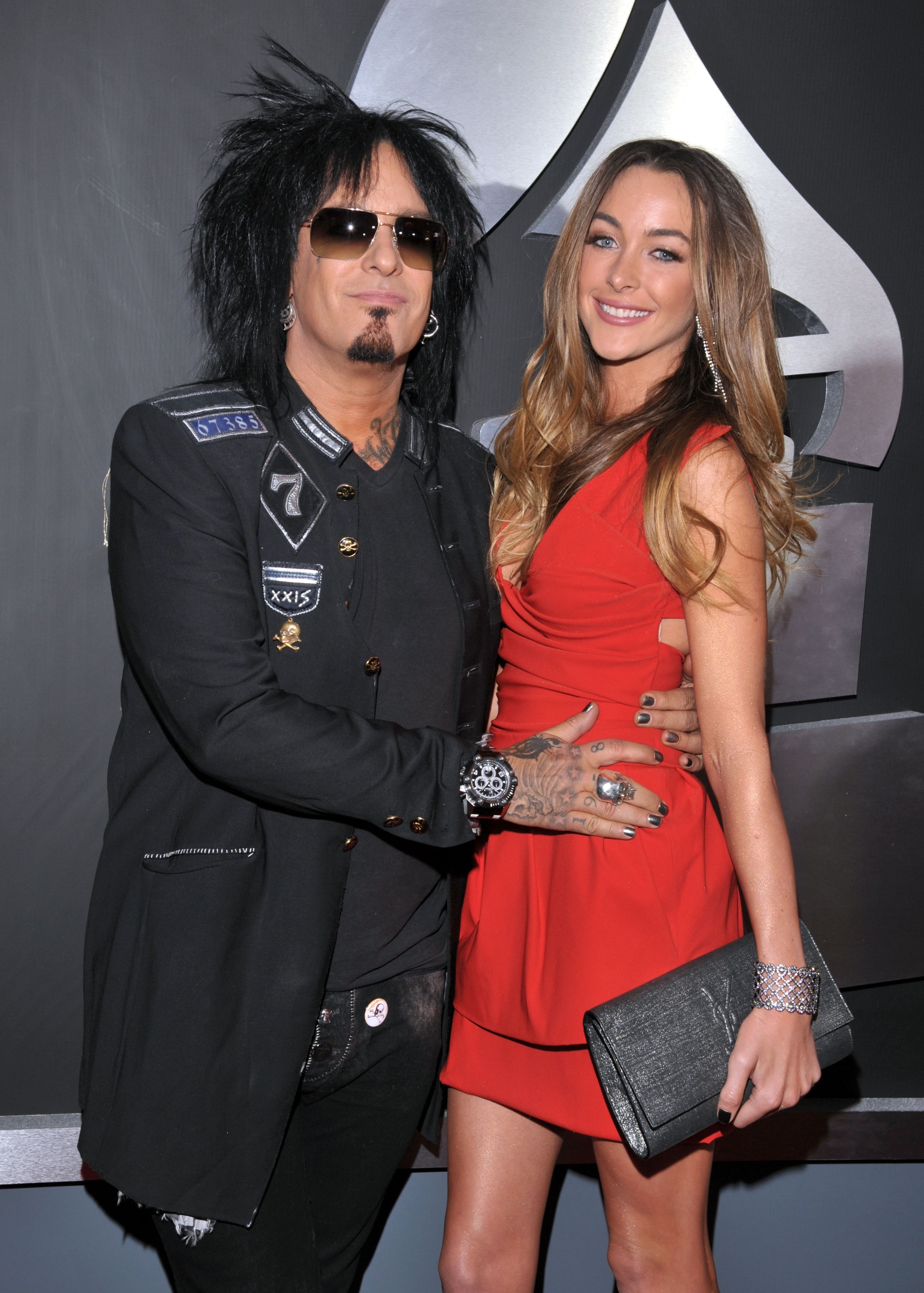 Motley Crue's Nikki Sixx and a guest arrive at the 53rd annual Grammy ...