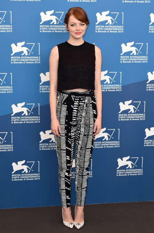 Emma Stone Arrives in the Shiniest Louis Vuitton Jumpsuit to the