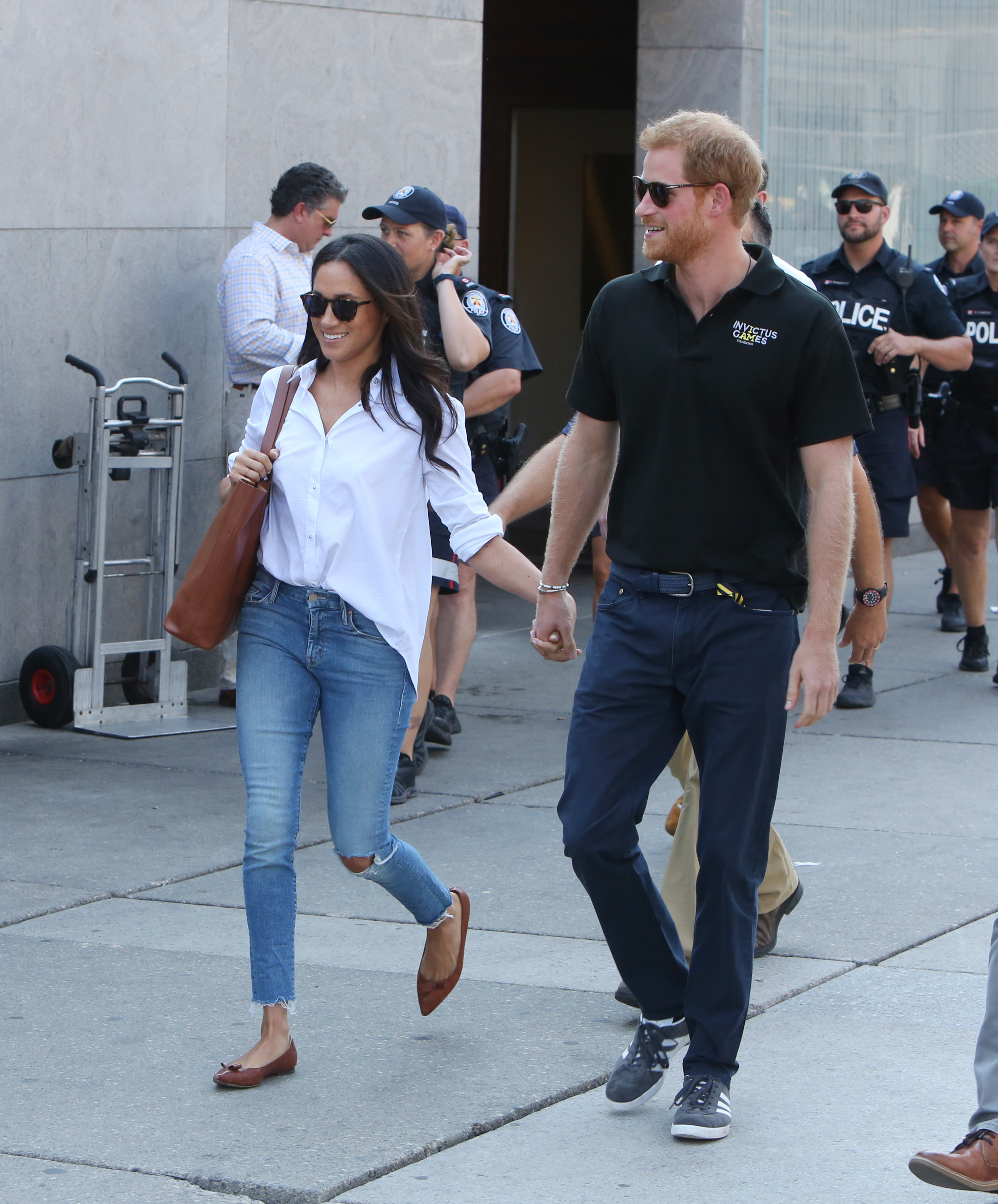 Meghan Markle steps out in Toronto with a H for Harry ring