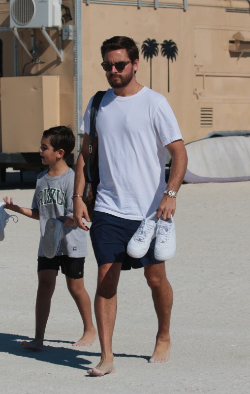 Kourtney Kardashian, Scott Disick and their son Mason at Barney's New York  (December 10)