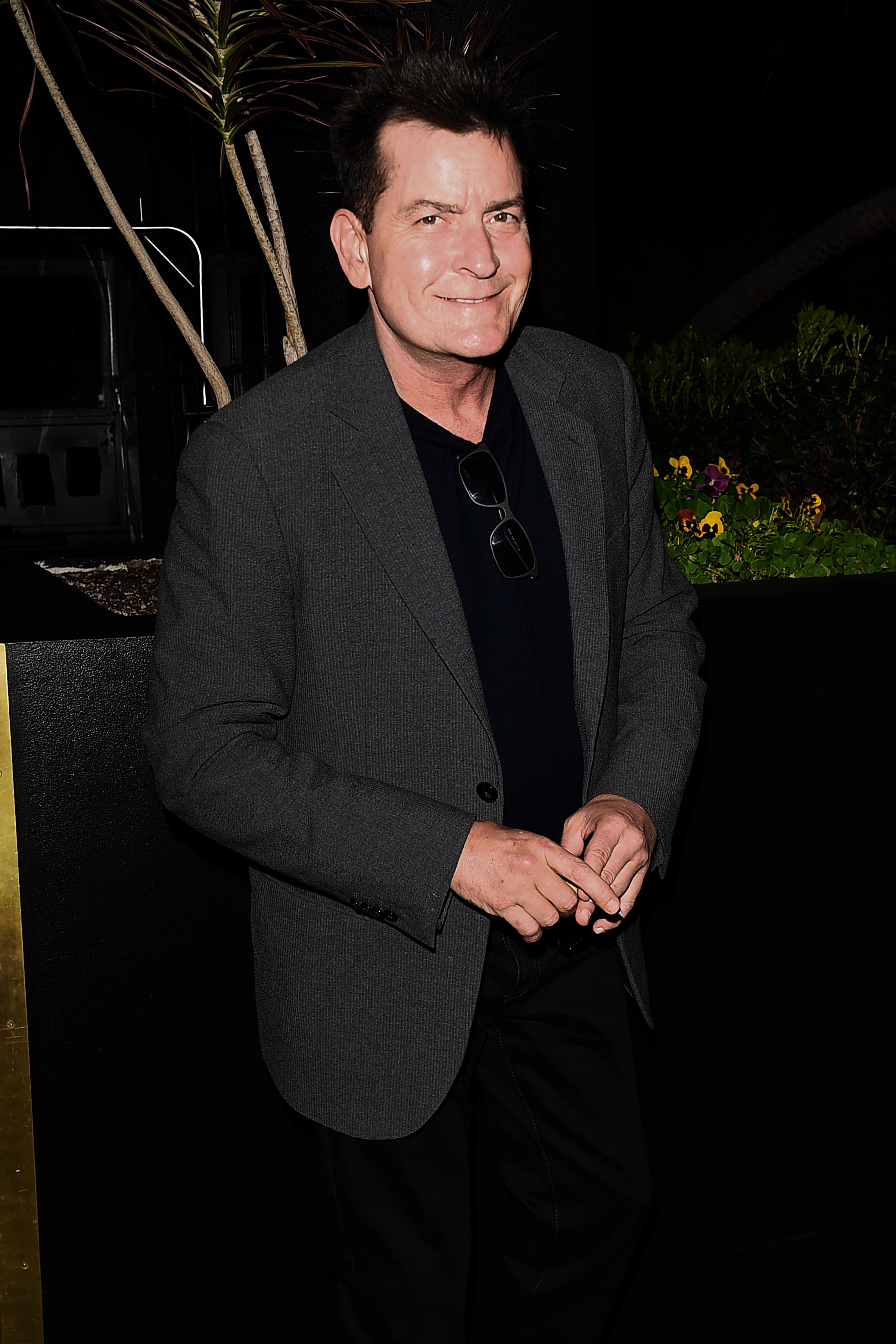 Charlie Sheen and National Enquirer settle defamation suit