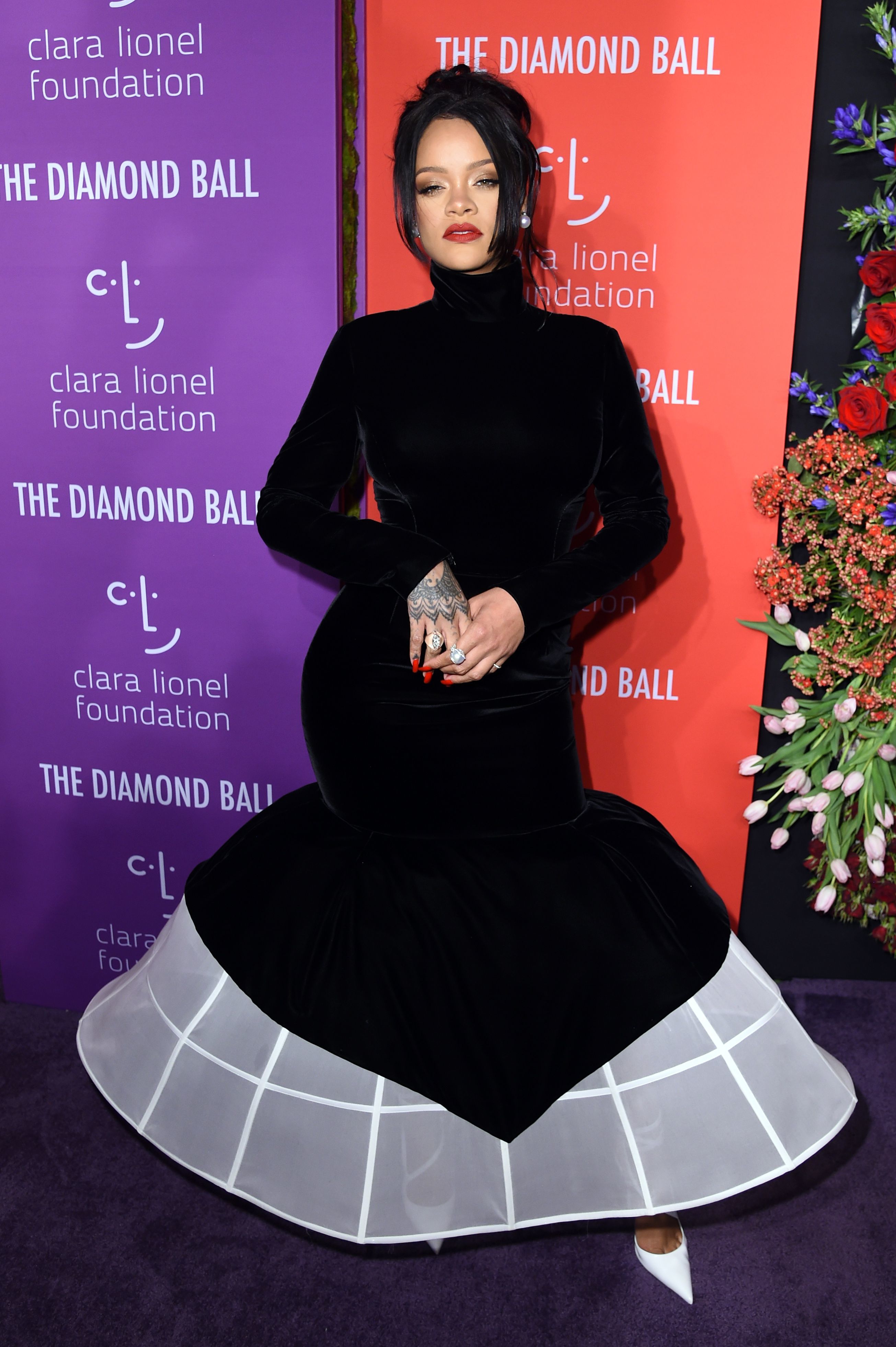 Rihanna Does Business Casual in an Edgy Cutout Blazer & Ball Cap