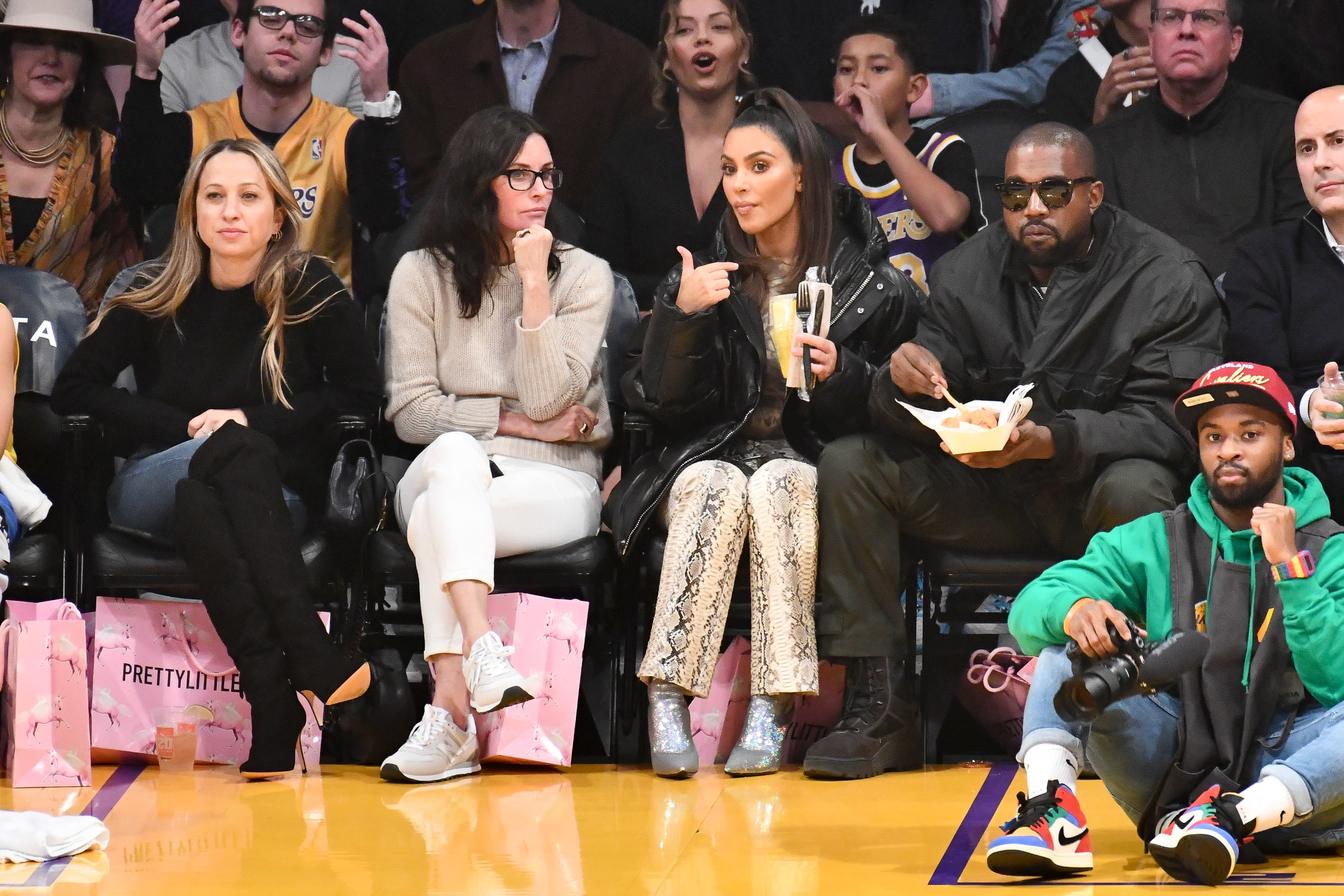 Little asian woman courtside lakers