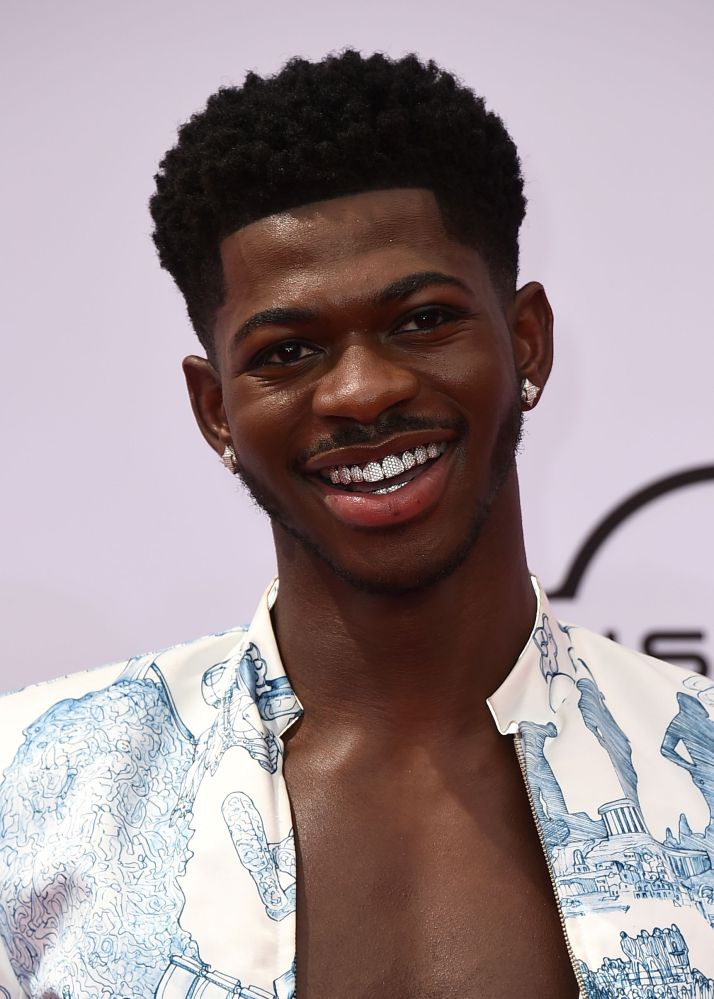 Lil Nas X claps back at critics of his on-stage kiss, fashion at BET ...