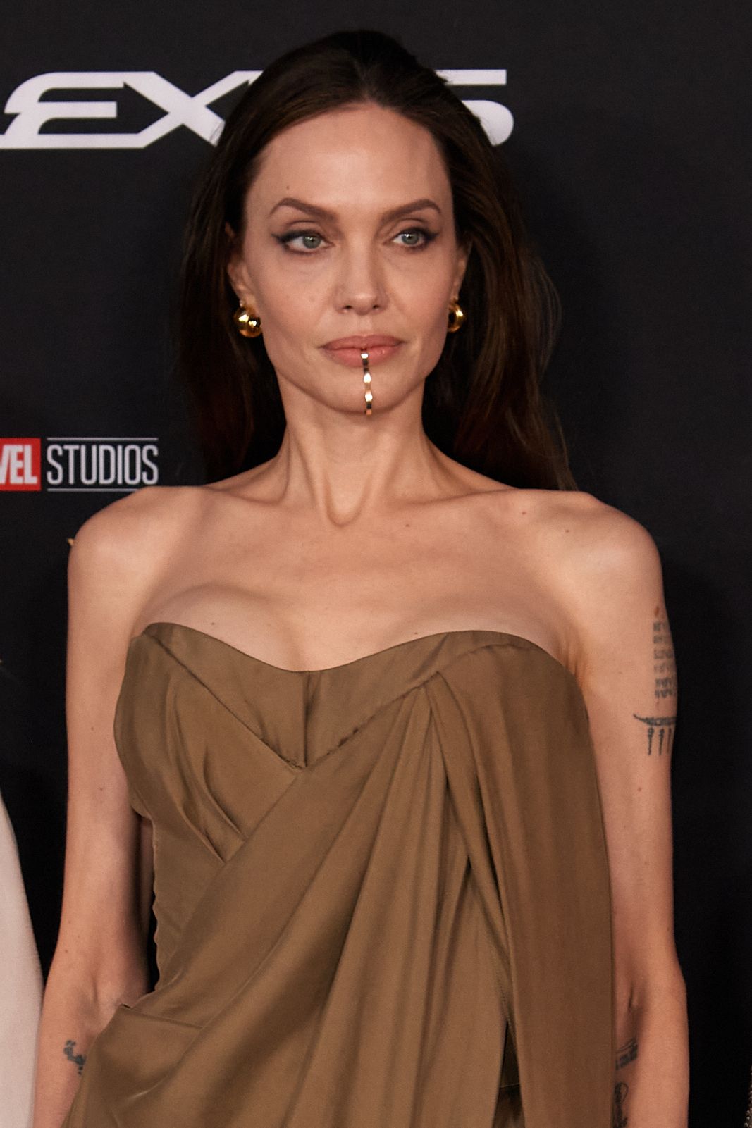 Angelina Jolie Slips on Pumps and Keeps It Classy in Black Midi