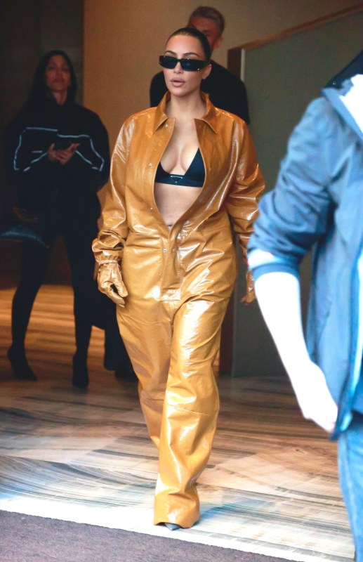 Kim Kardashian Wears a Flame-Print Top and Fuzzy Accessories