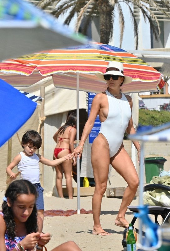 Celebs Wearing White Bikinis & Swimsuits: Pics Of Eva Longoria