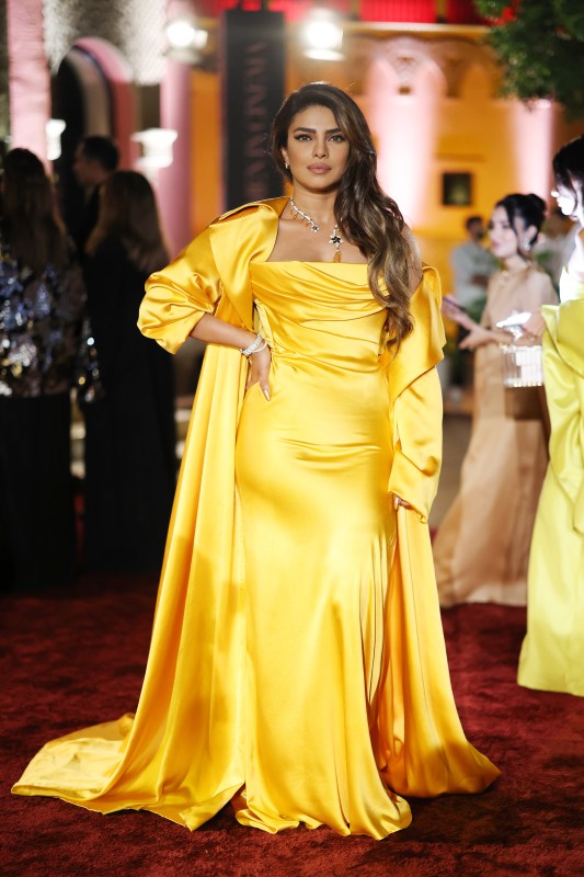 Rihanna Wows in Revealing Yellow Silk Robe