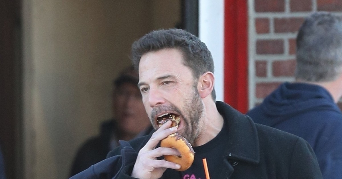 Ben Affleck enjoying Dunkin' Donuts Super Bowl commercial Gallery