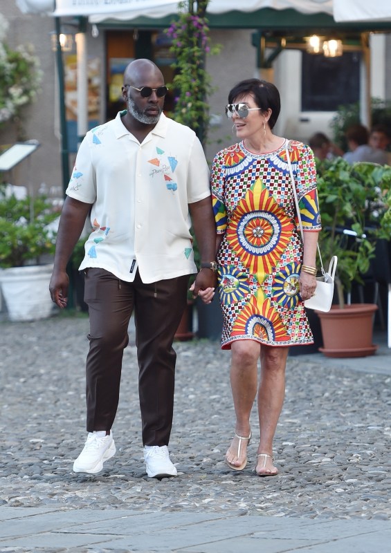 Kris Jenner, 64, Stuns In Lace White Dress & Holds Hands With Corey Gamble,  39, On Romantic Vacay