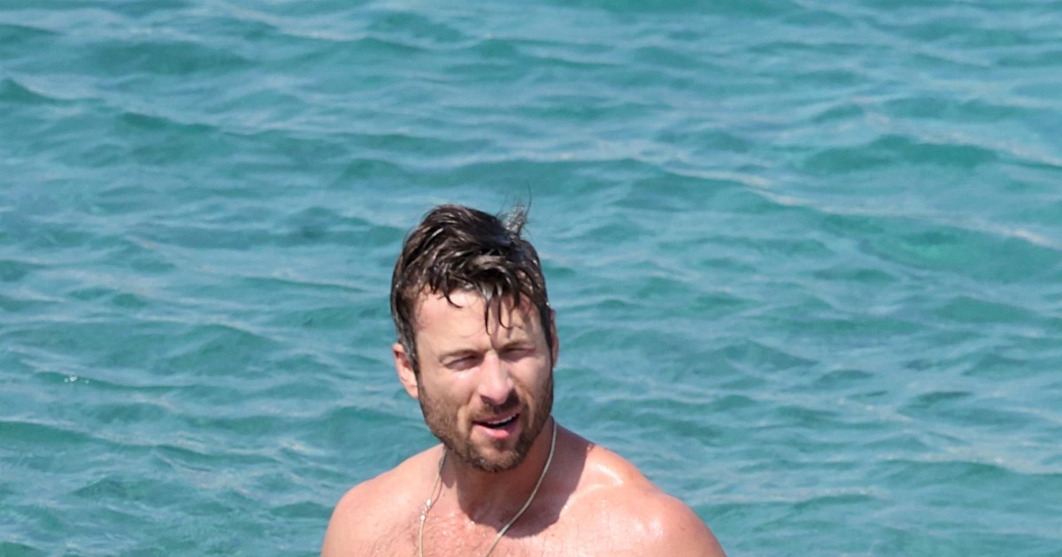 Shirtless Glen Powell Looks Hotter Than Ever While Filming Beach