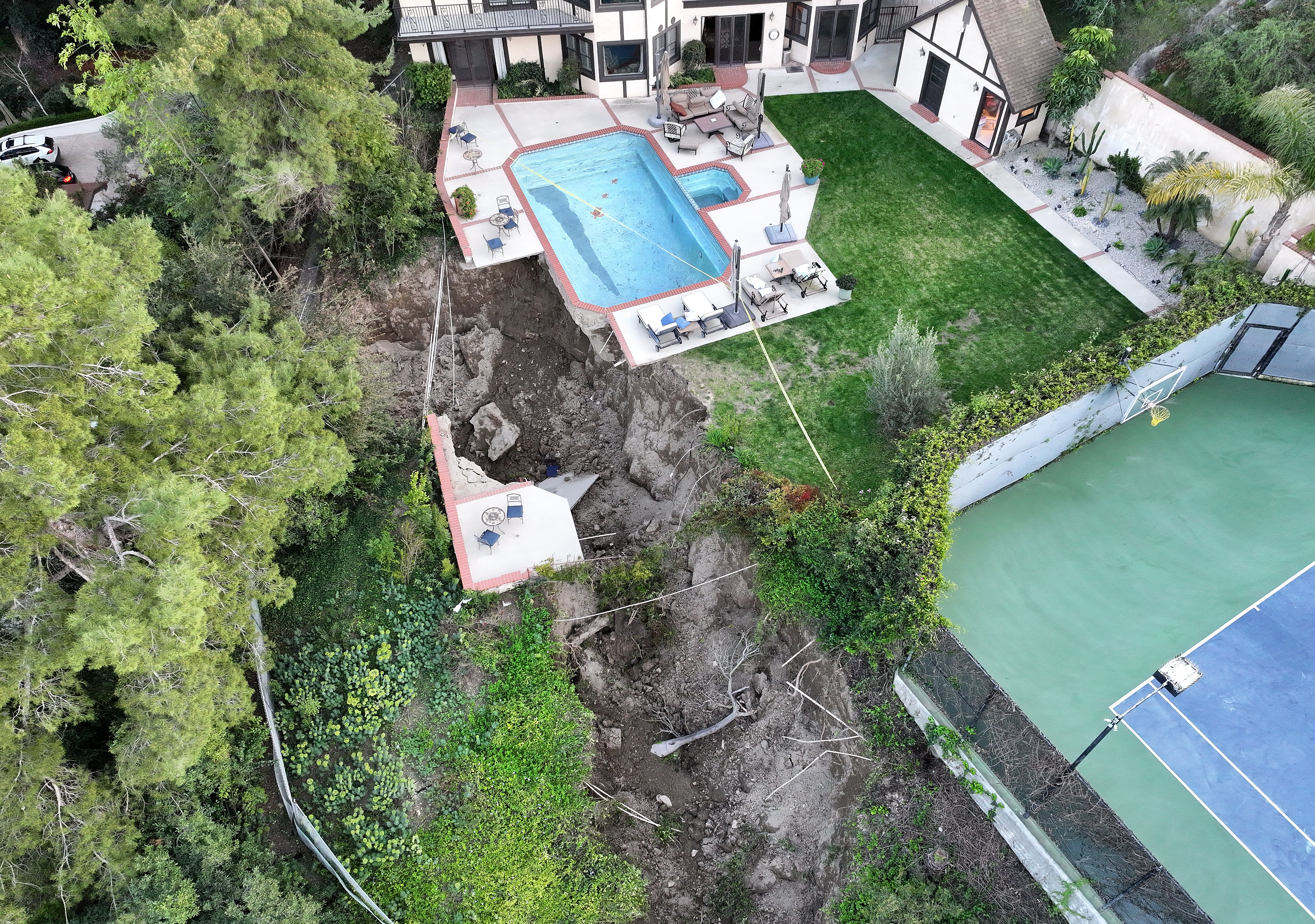 Landslide Destroys A Home And Leaves Multimillion-dollar Mansions ...